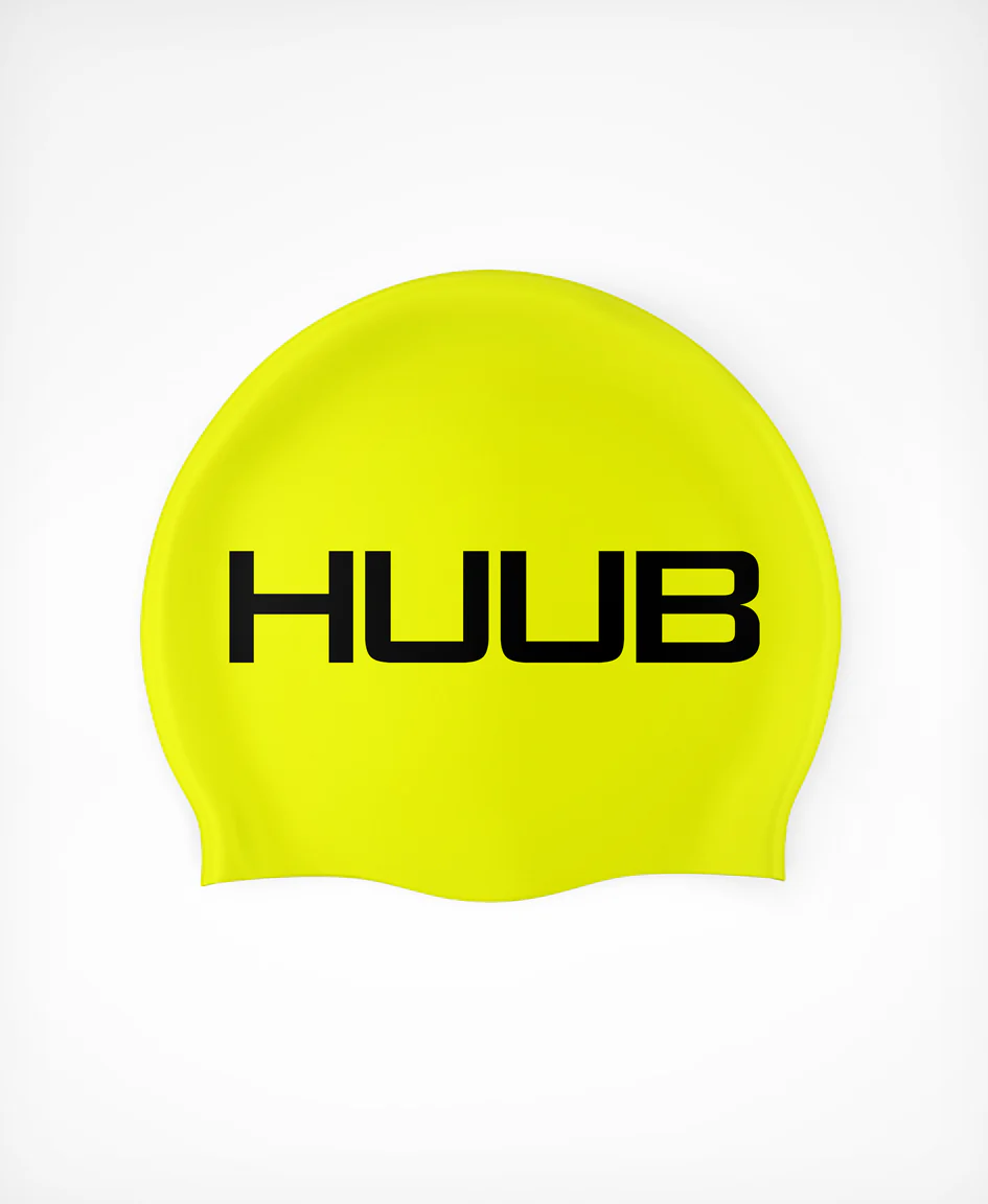 Bright orange HUUB silicone swim cap with a smooth, snug fit, ideal for competitive and recreational swimming.