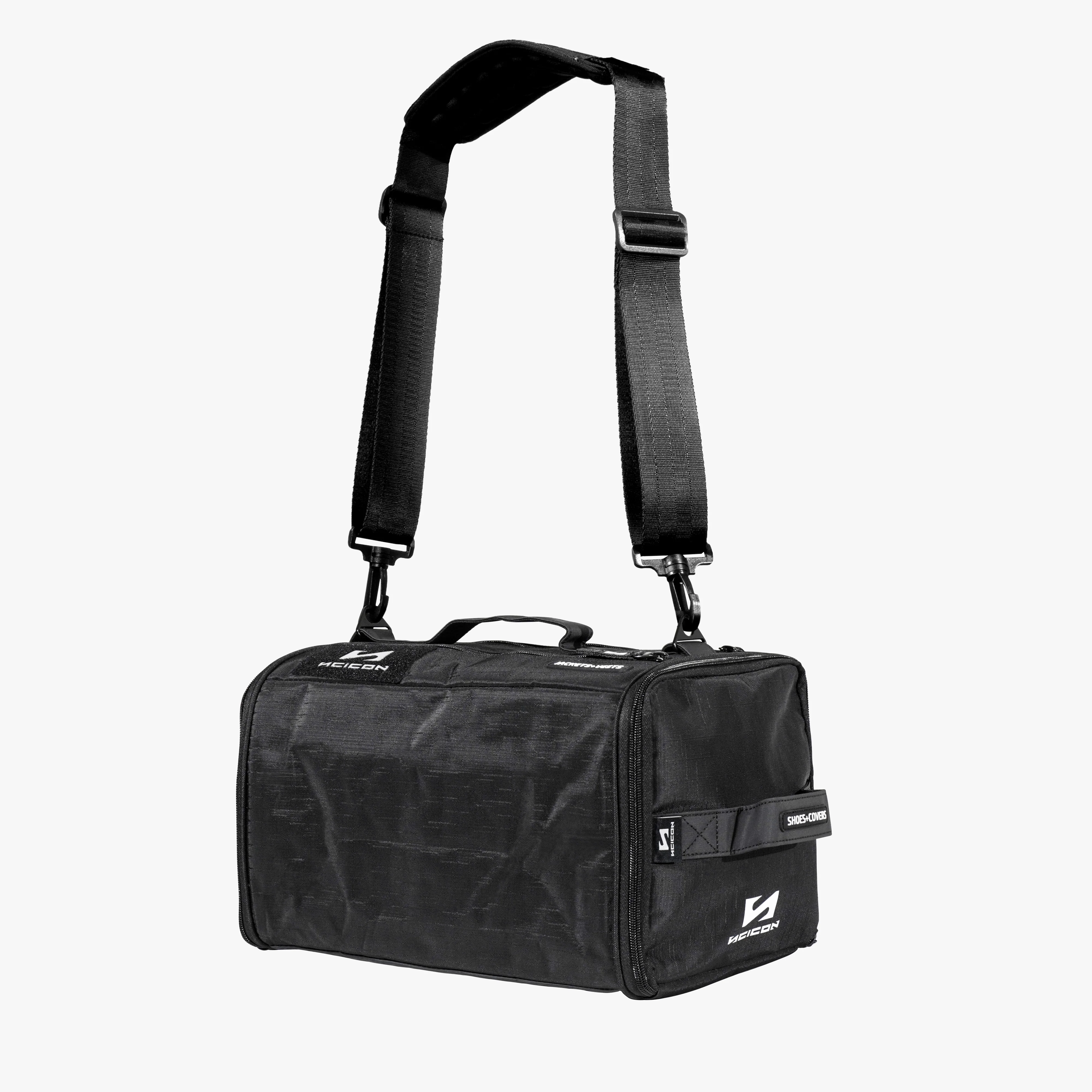 Scicon cycling rain gear bag with waterproof fabric and adjustable straps for storing and protecting cycling apparel in wet weather.